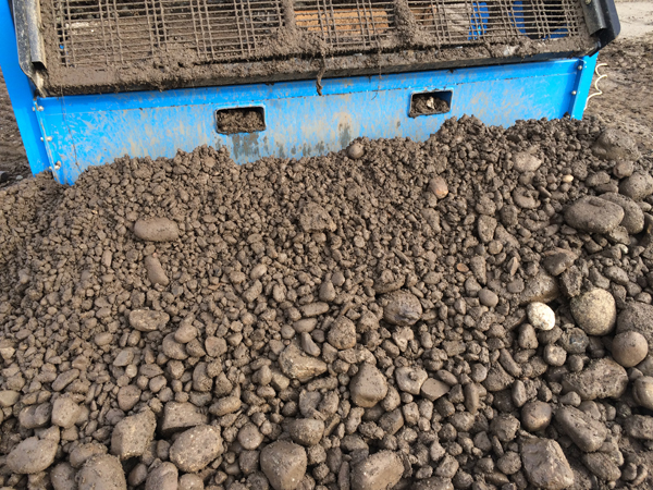 Screening Asphalt with our Topsoil Screener Rental