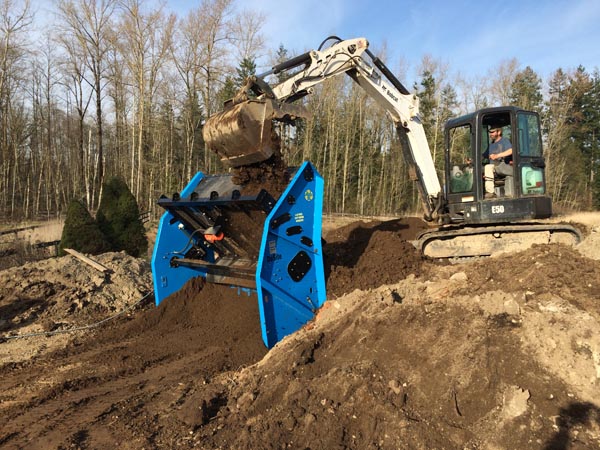Screening Topsoil with our Topsoil Screener Rental